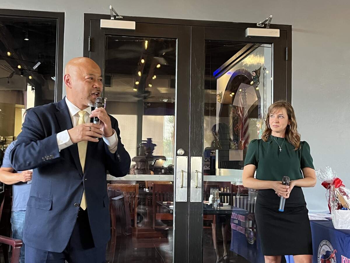 Fresno City Councilmembers Vong Mouanoutoua, left, and Diane Pearce debate at a meeting of the Fresno County Republican National Hispanic Assembly at Mama Iguana’s in Fresno on July 20, 2026.